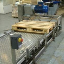 Wood Pallet Handling on Chain Conveyor